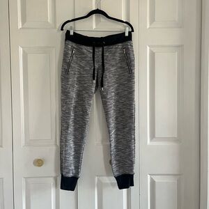 Grey and black marled tie front joggers with zipper pockets